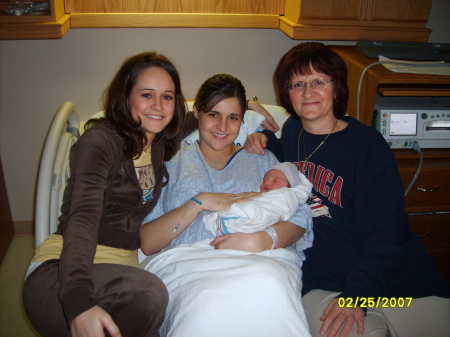 Me and my girls and my first grandbaby