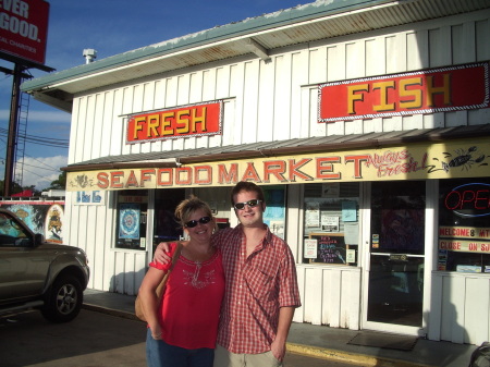 Deb and Mont in front of fish market