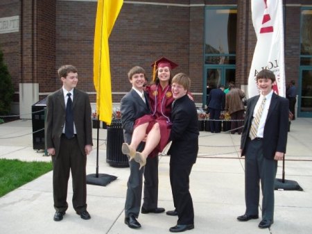 Little Brothers with Sister at Graduation