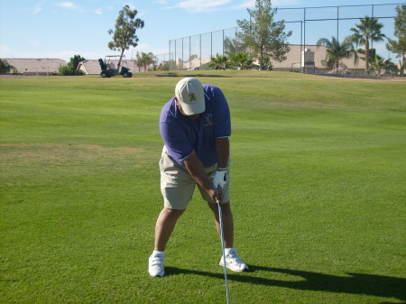 Chuck trying to play golf in Arizona.