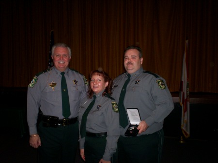 Me , Deb and the sheriff at award ceremony.