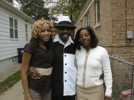 a cheesey moment for my dad with 2 young ladys