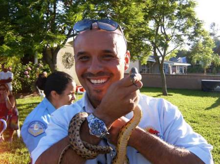 HOLDING A SNAKE