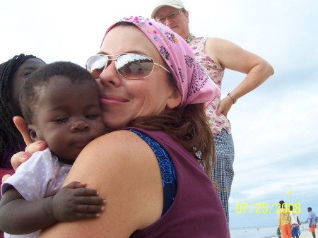 Me with an orphan baby in Africa