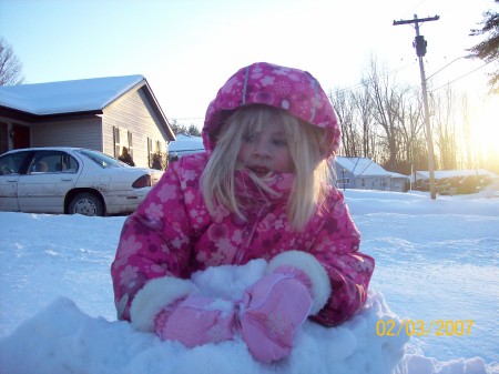 My daughter in the snow