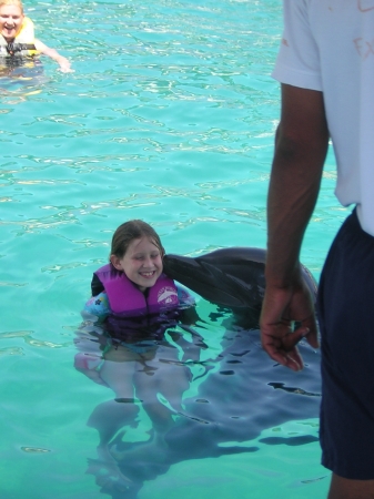 Nicole gets a dolphin kiss in the D.R.!