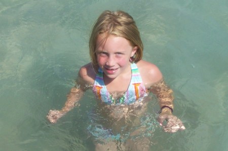 Maddy swims in Torch Lake