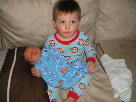 Mason holding Logan