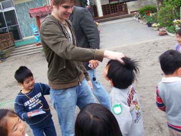 Scott with the Japanese preschoolers