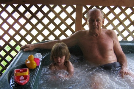 grandbaby Neeve and I enjoying my spa.