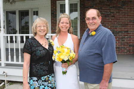 Dad, Mom and I on my wedding day.