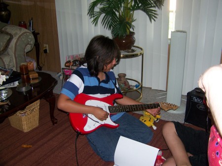 Noah and his new guitar
