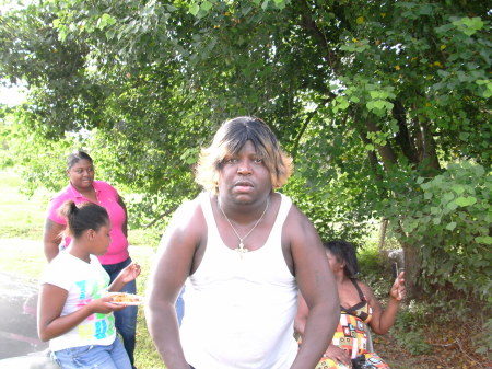 my brother in law w/his sis wig on