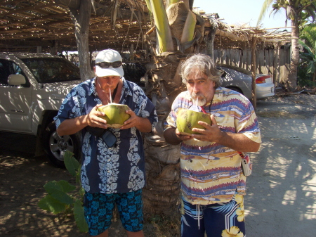 Drinking some coconut milk.