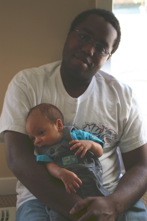 Kyshon holding grandchild #7 - Jayce