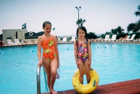 Cora and Charis by the pool.