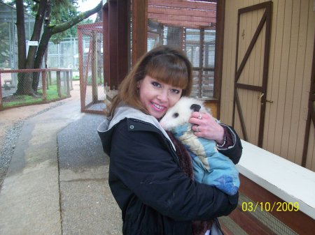 Cherise holding a baby opossum