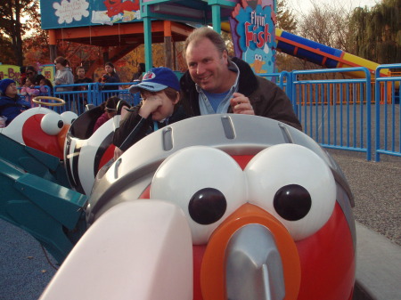 David & Jimmy on Elmo's flying fish ride 10/08