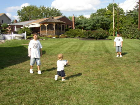 grand kids and Mike playing soccer