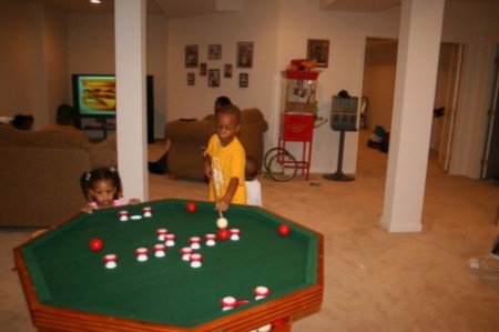 my son and niece in my rec room.