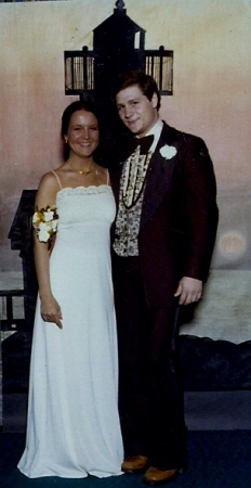 Pretty girl with the guy in the BROWN tux.