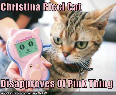 funny-pictures-christina-ricci-cat-pink-thing