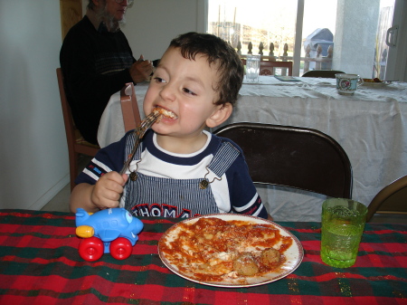 Justin eating Ravioli at Christmas 2008