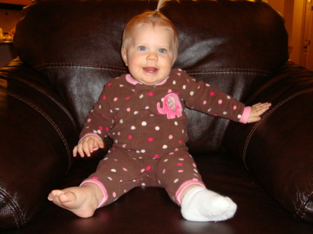 Addy sitting in the papa bears chair. :-)