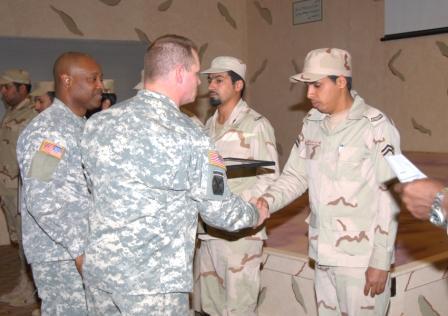 giving certificates to Saudi Soldiers