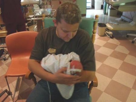 Gary holding Riley for 1st time