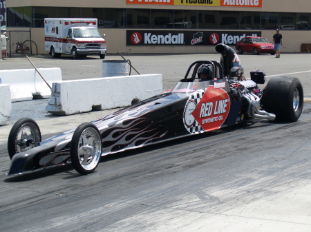 Jerry Noonan with our Red Line Oil car
