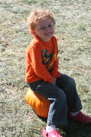 Nathan on a pumpkin - October festivities