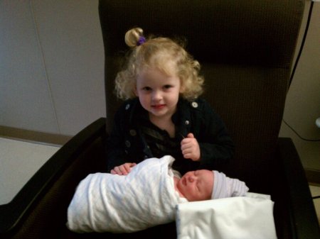Ella and her new baby siis Vivienne