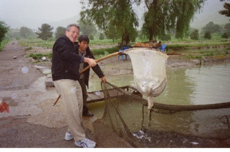 Scooping trout in Kazakhstan, 2007