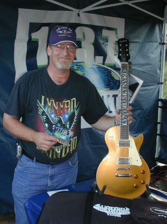 Me with Lynyrd Skymyrd guitar I won