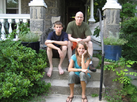 On the front stoop, with son and daughter