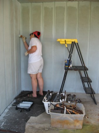 Pat Staining the Front Porch Wall