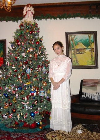 Livi in 90 yr old dress with tree