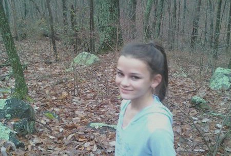 Macara hiking in the woods