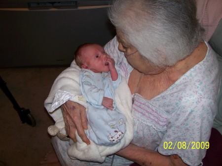 my mom holding little nathan