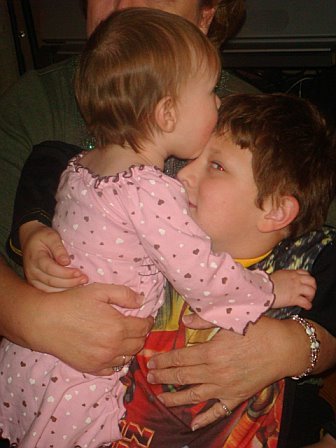 Hannah kissing her brother