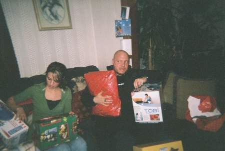 Joey and Kara opening Ryder's presents