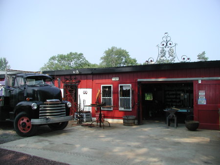 The Blacksmith Shop and Antique Work Truck