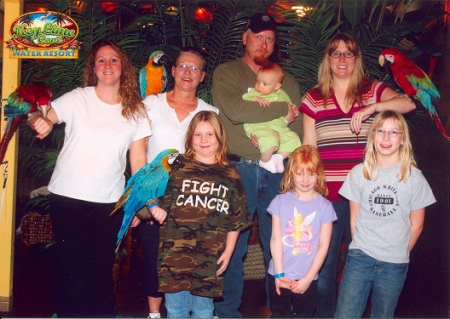 Family Photo with Macaw's at Keylime Cove