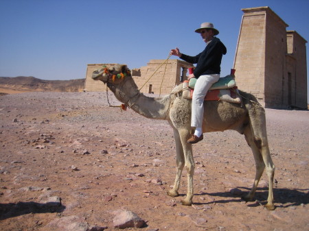 riding a camel between two temples
