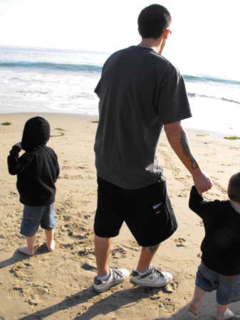 My husband and 2 sons at the beach