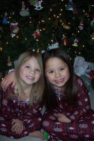 Sister love under the Christmas tree.