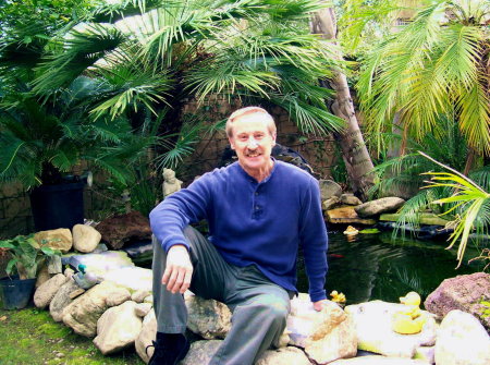 Doug by Koi Pond he built 3-09