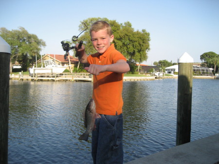 Son Peter showing off his catch