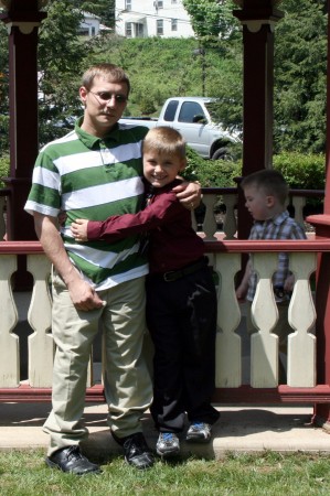 J.D. and his son Shiloh, with his other son in